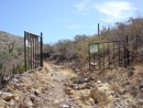 The gate to the ranch.  It comes complete with a lock to keep all the trespassers out.  At least those in cars.