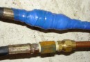 The hydraulic steering lines.  The blue one leaked.  You can see the bottom one with that big rectangular fitting in the middle.  That is the fitting that broke.  Weird huh?