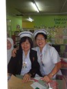 The nurse on the right is the one one that checked Tracy in for a checkup.  Nice bunch of happy women.