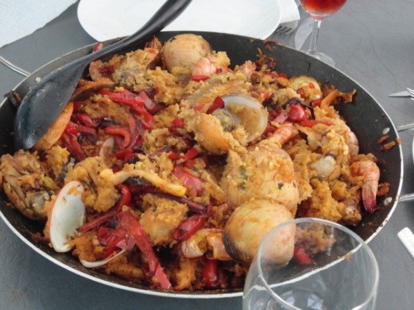 Paella on Azizah.  YUM!  Chicken, Clams, Shrimp, Calamari, peppers, chilis and rice with a bunch of spices.  Add in beer and wine and what a great meal.