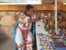 Huichol Indian doing bead work
