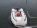 The dinghy filled with water and the gas tank floating