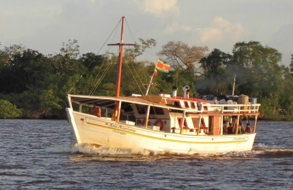 The boat traffic on the Suriname River reflects their Southeast Asian heritage.  This is a family fishing boat - we love the way they design, build, and colorfully paint their vessels.