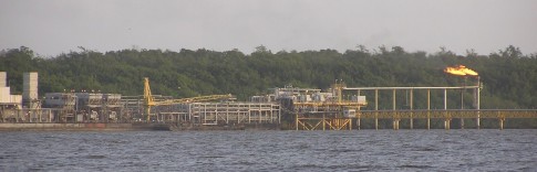 This production facility is located on Isla Cotorra, or north side of the river. Check out the orientation of that gas flare – there can be a lot of wind blowing up the Boca Pedernales from the Gulf of Paria, and if it is opposing an ebb, the Boca will be rough.