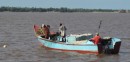 Laying fish nets on the Essequibo River