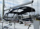 New Bimini.  Note the additional hand rails on sides and back of frame for safety.  