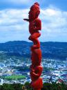 Tiki presiding over view of Wellington from lookout