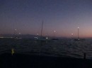 The anchor lights are on in La Cruz with the lights of Puerto Vallarta in the background