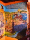A portion of the intricate mural depicting the history of the area