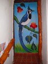 One of the many beautiful bird murals that decorate the walls of the hotel