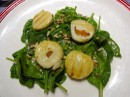 Welcome chez VOAHANGY, one of our signature plate: sauteed scallops on a bed of baby spinach.