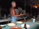 Mahini (The Godfather) preparing the wonderful pizza in his brickfire oven.