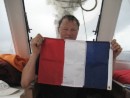 In preparation of landing: Uwe prepares the French Flag for landing