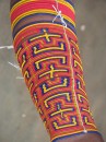 While looking at photos of the San Blas, I assumed these to be some sort of leg warmer! Almost all the women wear these beaded bracelets around their lower legs.