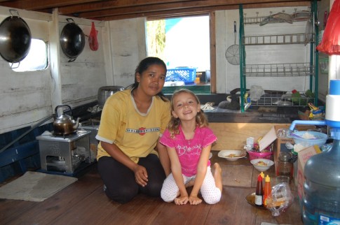 The wonderful chef on the river boat with her helper