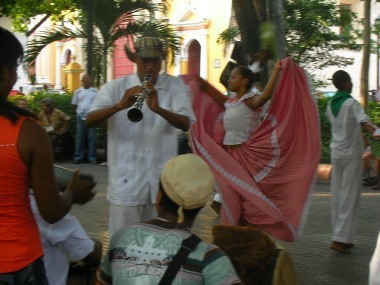 Clarinet player and Colombian dancers