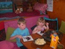 Geordi and Annika getting into chocoalte cake on baord Valiam