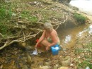 washer woman in creek