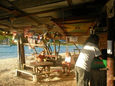Roger is foreground of his bar - hog Island
