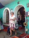 Doris coming out of a artisan tienda in Sayulita.