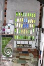 3) Just inside the entrance, there is a wall of bottles - very pretty in what little sunlight we had that day!  (Notice the fern "furl" in bottom left corner - you see that symbol everywhere here!)