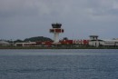 The control tower and airstrip are literally right on the water!