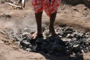A fire walker dancing on the hot rocks from the lovo!  Ouch!!!
