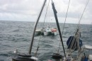 Taking Iwalani under tow - the seas were a bit rough and we weren