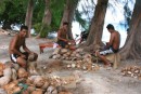 The "Copra Boys!"  These guys were sitting along side of the road in Rotoava - the main village on Fakarava - getting coconut ready to go into one of the drying sheds (I had put a picture of one of the sheds earlier). 