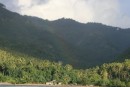 May be hard to see, but there was a beautiful rainbow shining down right in the middle of the village of Hanaiapa. (Hiva Oa)