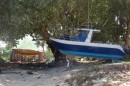 Yikes!  Many boats were thrown up on shore - luckily in Samoa, no cruising boats were damaged.  In American Samoa, however, several were destroyed and all of the 15 in the Pagopago anchorage were damaged.