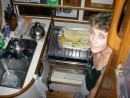 Chef Betsy in the galley prepares mahi-mahi...mmmmmmmmmmm!