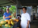 Linda buying papayas