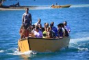 The first boat load of guests being ferried into the lagoon for the 2 week Church of Tuvalu gathering