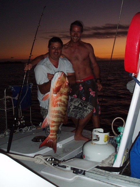 Andrew and Jason with dinner off Howick Island