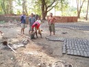 Making mud bricks for housing at Wodong - see story