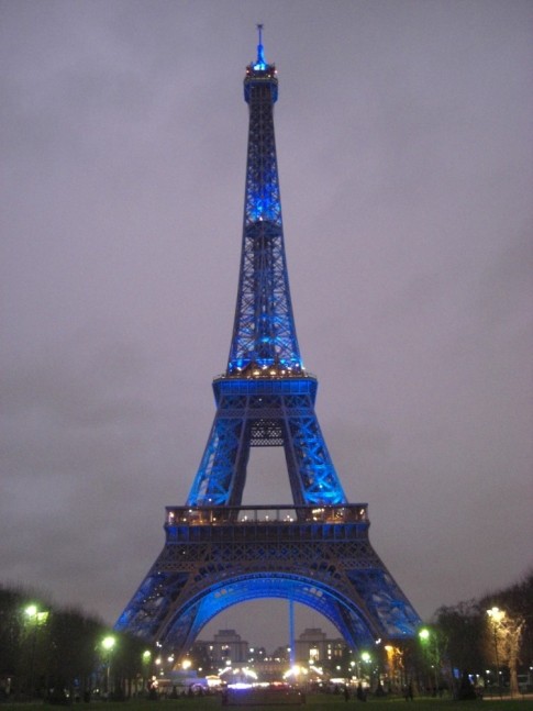 Blue Paris- the Eiffel Tower lit up at dusk