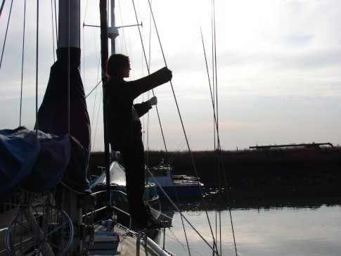 Being a teenager - iPod junkie: Evita chilling after a winter sail