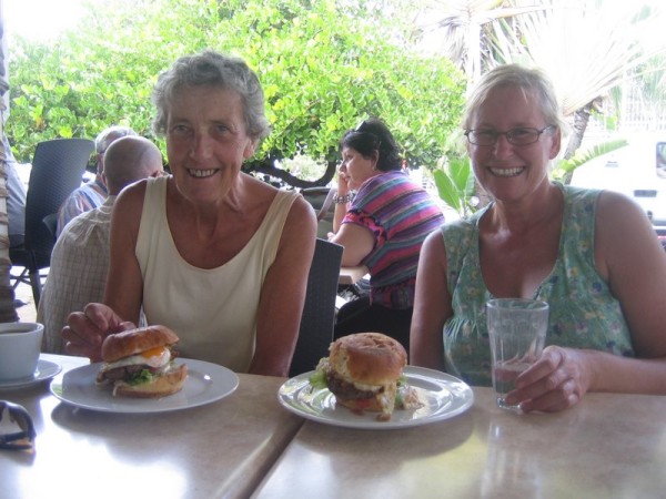 Pauline and Sue tuck into a tasty horse meat burger.