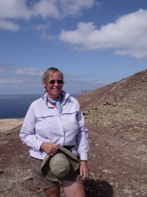 Sue,hiking atop one of the volcano ash cones at the island of Graciosa, just North East of Lanzarote.