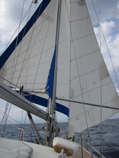 A hybrid version of an unbalanced twin headsail rig. Not enough sail area but too much wind to rig the dual sails on the same foil.