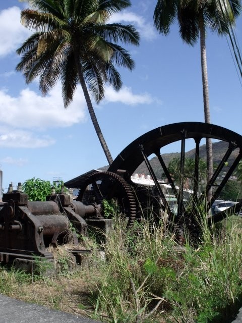 A water wheel and press for extracting the syrup from the sugar cane. The name cast into the equipment indicated it was manufactured in Britain by a company based in both London and Derby. Vestiges of a bygone empire.