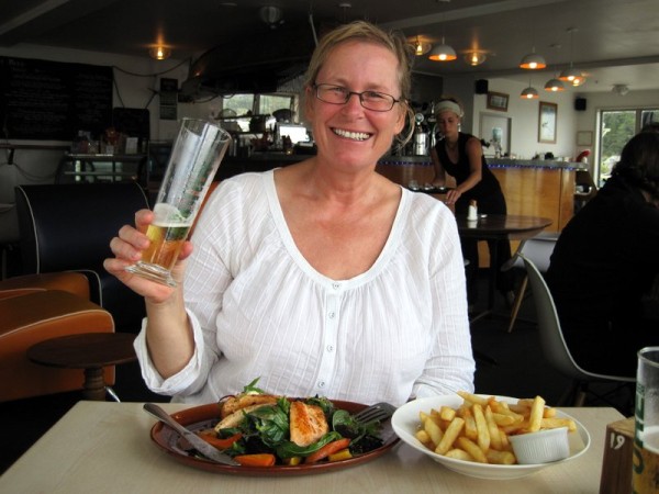 Sue enjoys a salmon salad and chips after a day of walking.