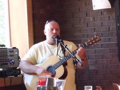 A local bar had a musician playing Blue Grass music amongst other numbers.