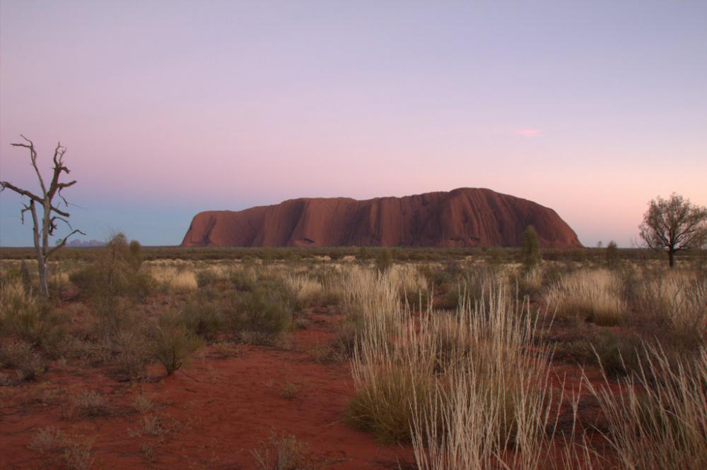 Uluru at dawn a sequence of three