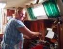 Sue preparing a meal on the high seas