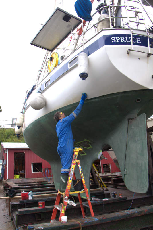 Andy cleaning the hull