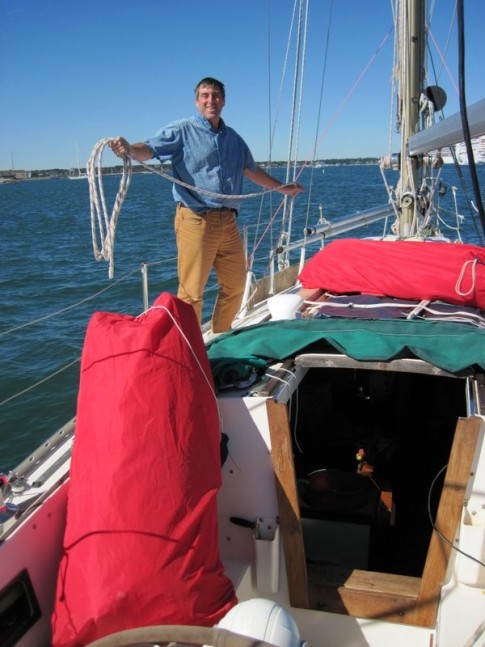 Andy coiling up sheets and stowing sails before shipping back to UK.