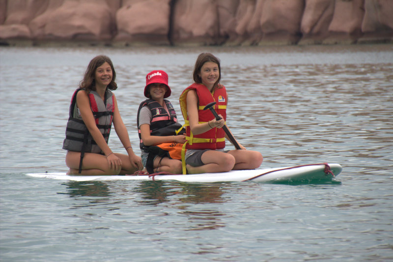 Three girls on a boat