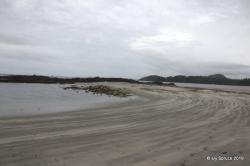 Sandy beach rugged point